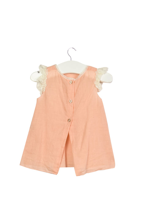 A Pink Short Sleeve Dresses from Nanos in size 0-3M for girl. (Back View)