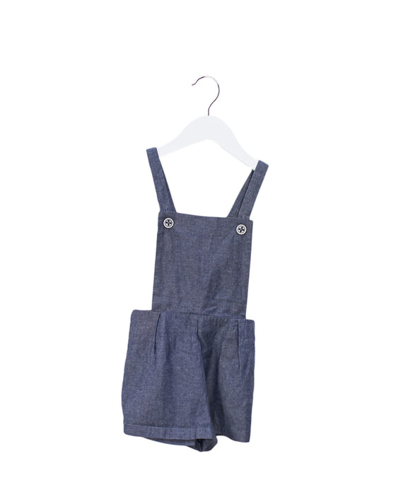 A Navy Overall Shorts from Hucklebones in size 4T for girl. (Front View)