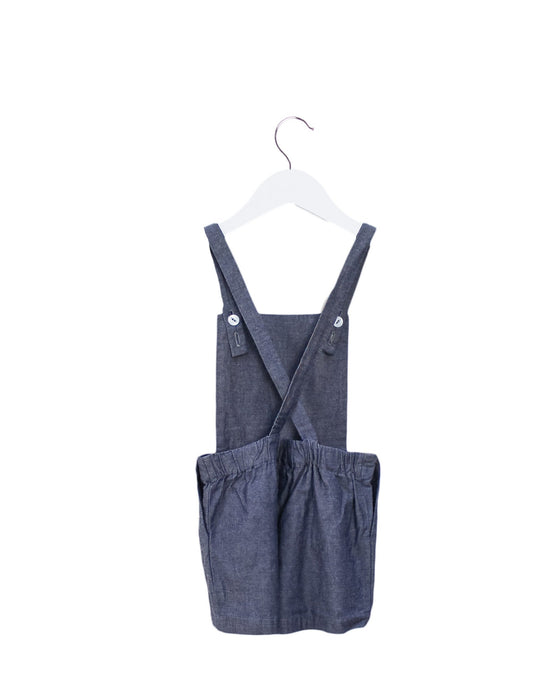 A Navy Overall Shorts from Hucklebones in size 4T for girl. (Back View)