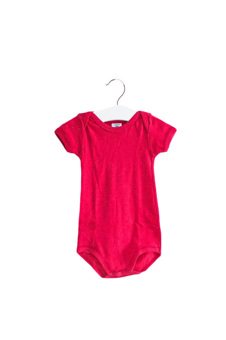 A Pink Short Sleeve Bodysuits from Petit Bateau in size 6-12M for girl. (Front View)