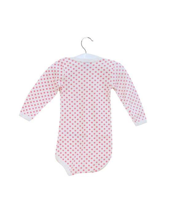 A White Long Sleeve Bodysuits from Petit Bateau in size 3-6M for girl. (Back View)