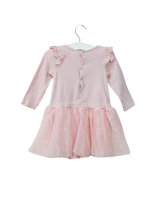 A Pink Long Sleeve Bodysuits from Seed in size 6-12M for girl. (Front View)