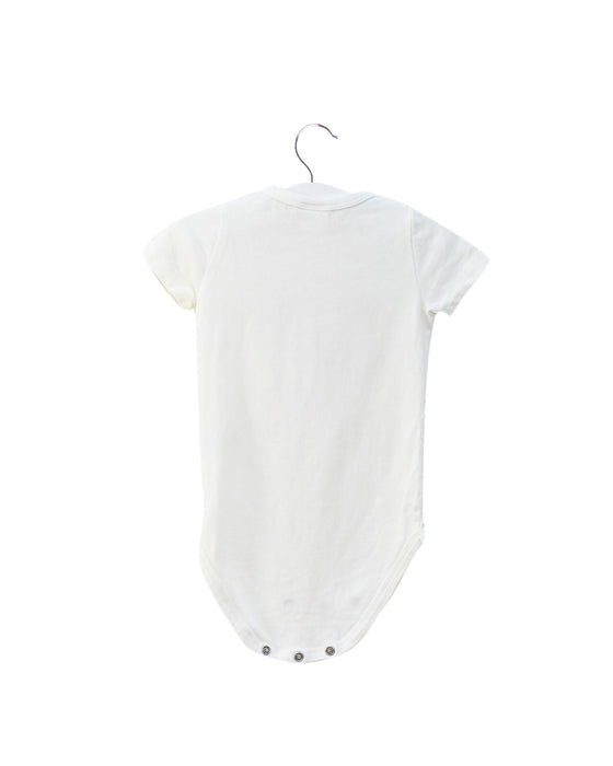 A Ivory Short Sleeve Bodysuits from Seed in size 3-6M for girl. (Front View)