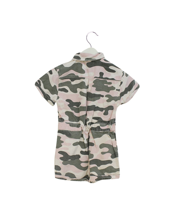 A Pink Short Sleeve Rompers from Seed in size 5T for girl. (Back View)