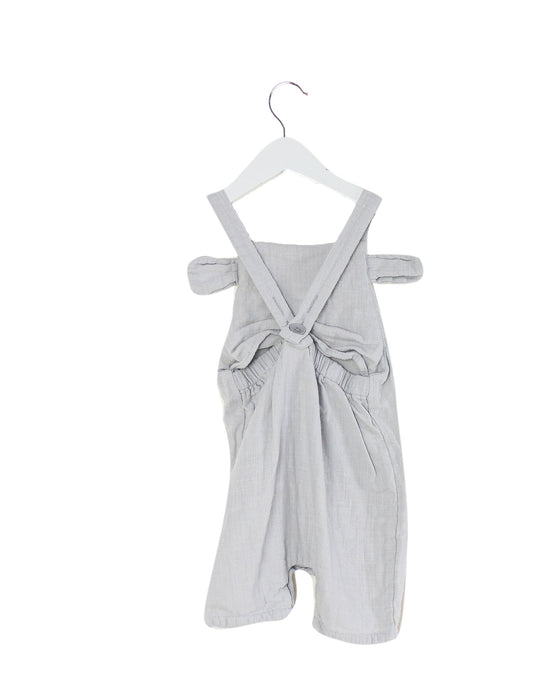 A Grey Sleeveless Rompers from Seed in size 3-6M for girl. (Back View)
