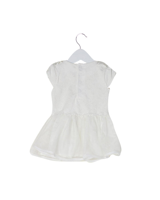 A White Sleeveless Tops from Miniclasix in size 12-18M for girl. (Back View)