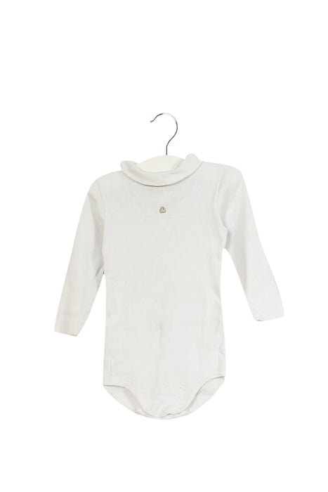 A White Long Sleeve Bodysuits from Petit Bateau in size 6-12M for neutral. (Front View)