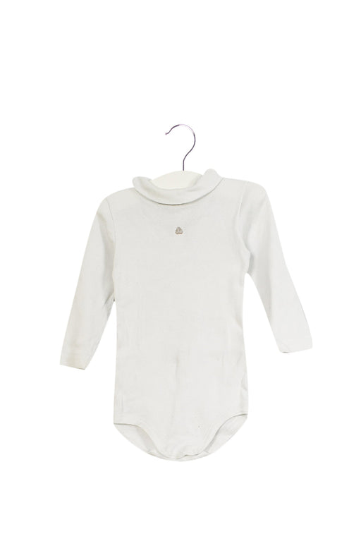 A White Long Sleeve Bodysuits from Petit Bateau in size 6-12M for neutral. (Front View)