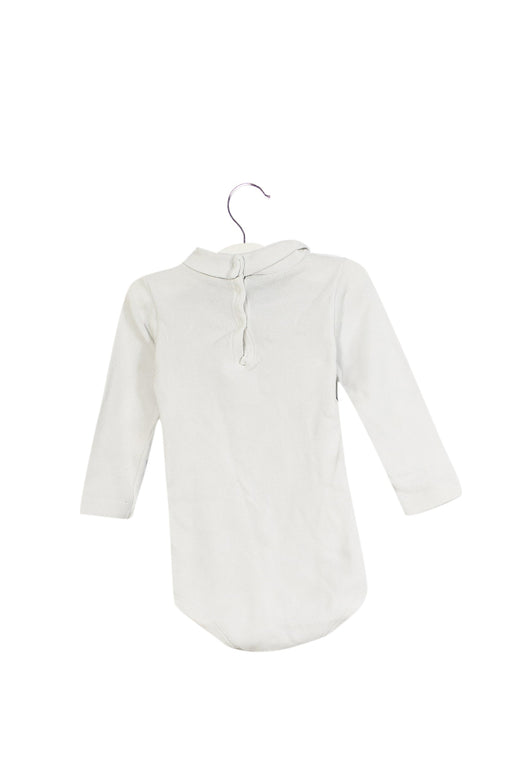 A White Long Sleeve Bodysuits from Petit Bateau in size 6-12M for neutral. (Front View)