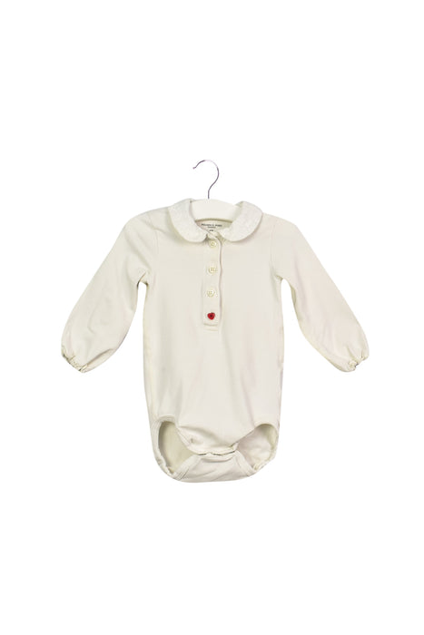 A White Long Sleeve Bodysuits from Polarn O. Pyret in size 3-6M for girl. (Front View)