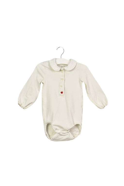 A White Long Sleeve Bodysuits from Polarn O. Pyret in size 3-6M for girl. (Front View)