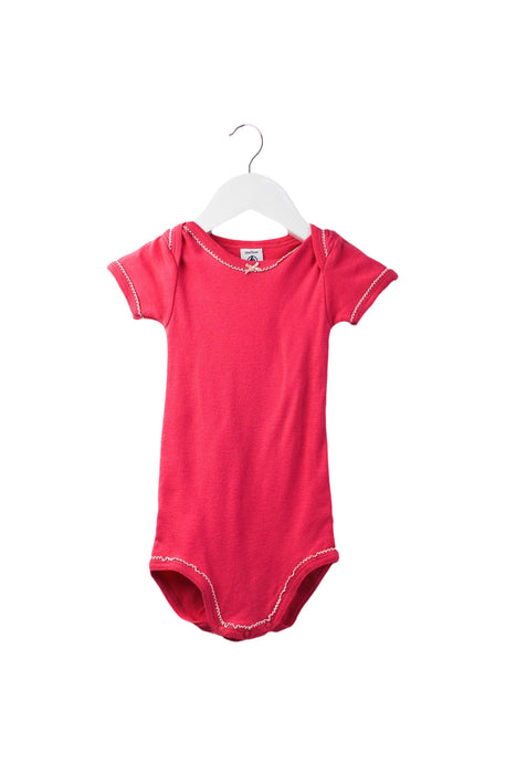A Pink Short Sleeve Bodysuits from Petit Bateau in size 6-12M for girl. (Front View)
