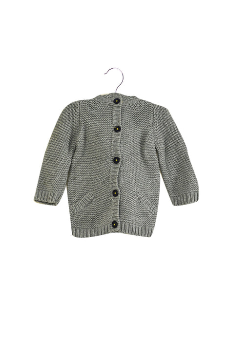 A Grey Cardigans from Boden in size 6-12M for girl. (Front View)