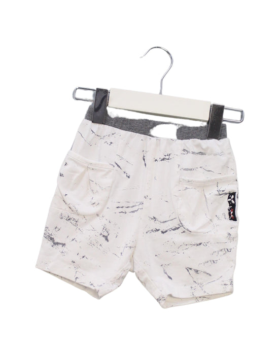 A White Shorts from Momonittu in size 6-12M for girl. (Front View)