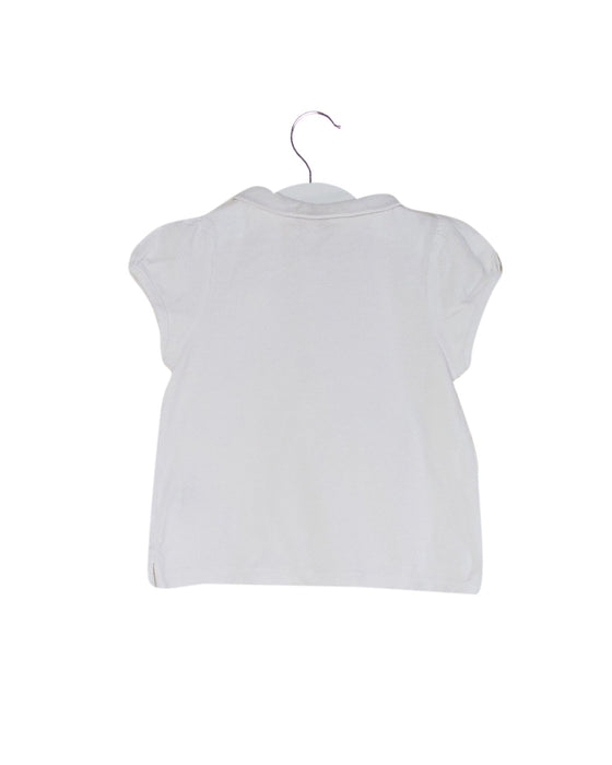 A White Short Sleeve Polos from Jacadi in size 4T for girl. (Back View)