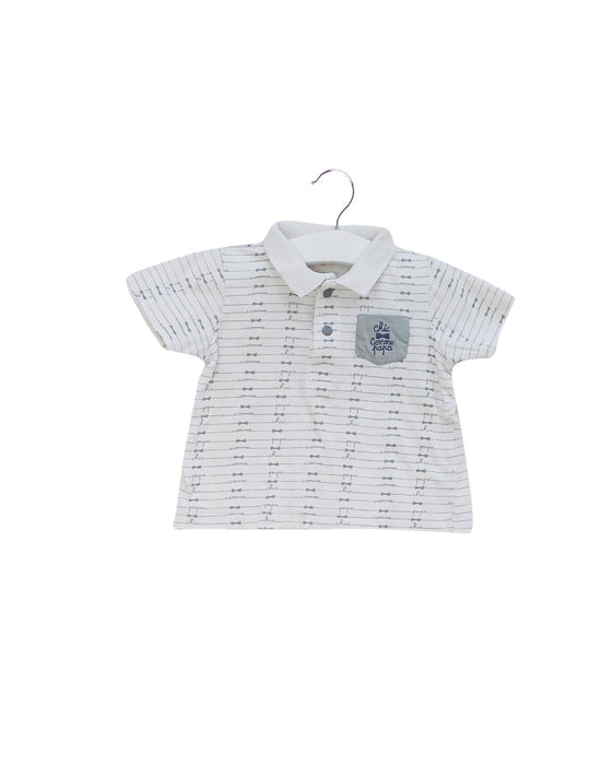 A White Short Sleeve Polos from DPAM in size 3-6M for boy. (Front View)
