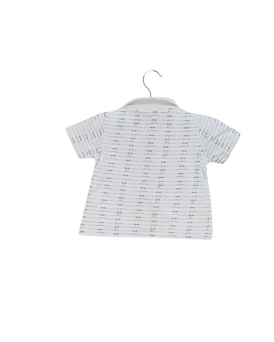 A White Short Sleeve Polos from DPAM in size 3-6M for boy. (Back View)