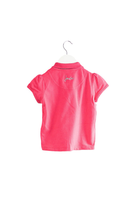 A Pink Short Sleeve Polos from Joules in size 6-12M for girl. (Back View)