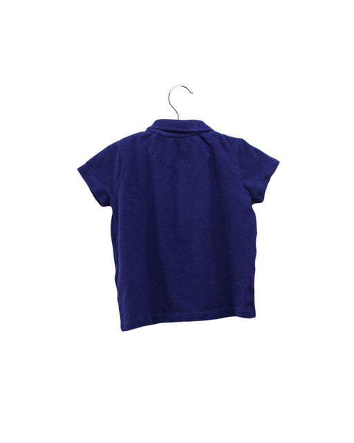 A Navy Short Sleeve Polos from Boden in size 6-12M for boy. (Front View)