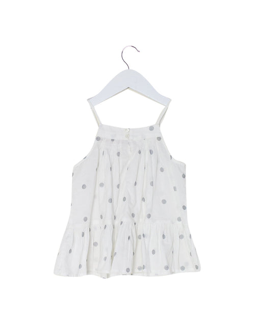A White Sleeveless Tops from Bonpoint in size 4T for girl. (Front View)