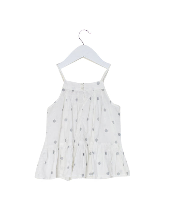 A White Sleeveless Tops from Bonpoint in size 4T for girl. (Front View)