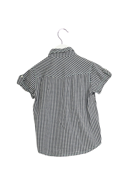 A Navy Short Sleeve Tops from Mini A Ture in size 4T for girl. (Front View)