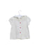 A Ivory Short Sleeve Tops from Nanos in size 6-12M for girl. (Back View)