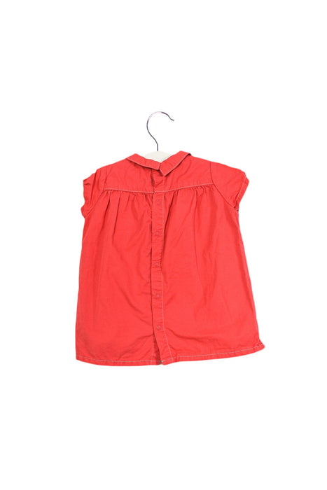 A Pink Short Sleeve Tops from Petit Bateau in size 6-12M for girl. (Back View)