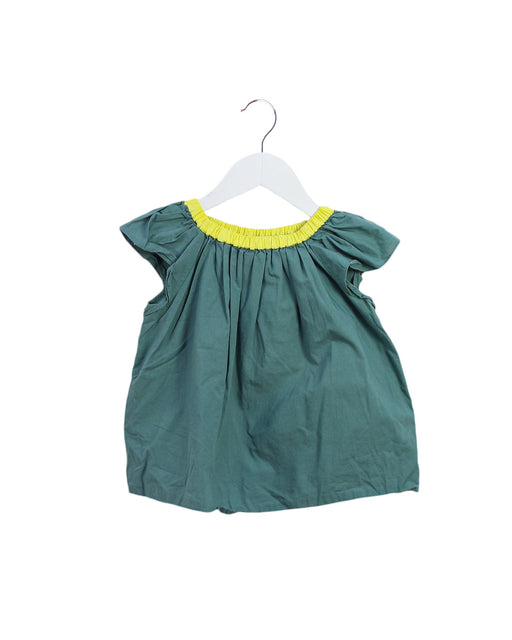 A Green Short Sleeve Tops from Bonpoint in size 4T for girl. (Front View)