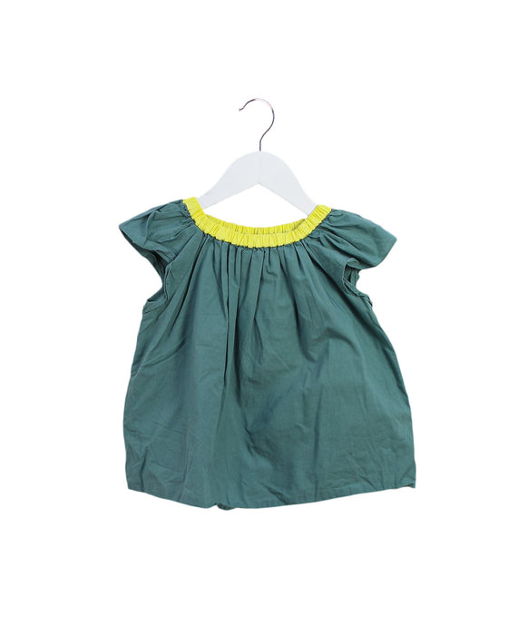A Green Short Sleeve Tops from Bonpoint in size 4T for girl. (Front View)