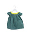 A Green Short Sleeve Tops from Bonpoint in size 4T for girl. (Front View)