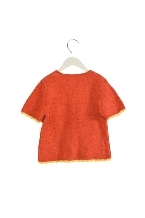 A Orange Short Sleeve Tops from Chickeeduck in size 5T for girl. (Back View)