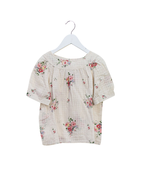A Ivory Short Sleeve Tops from Bonpoint in size 4T for girl. (Front View)