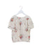 A Ivory Short Sleeve Tops from Bonpoint in size 4T for girl. (Front View)