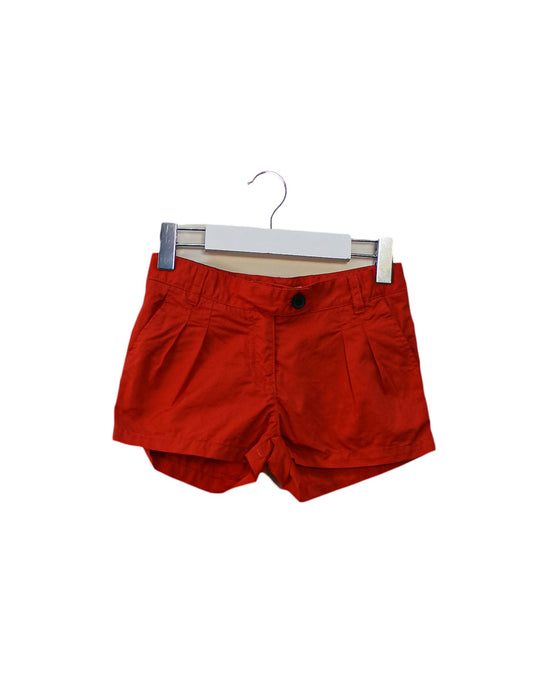 A Orange Shorts from Bonpoint in size 4T for girl. (Front View)