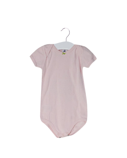 A Pink Short Sleeve Bodysuits from Petit Bateau in size 12-18M for girl. (Front View)