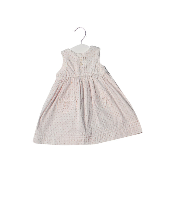 A White Sleeveless Dresses from Cyrillus in size 3-6M for girl. (Front View)