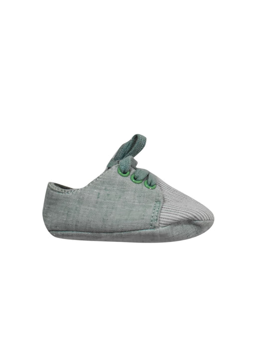 A Green Slip Ons from Chateau de Sable in size 6-12M for boy. (Front View)
