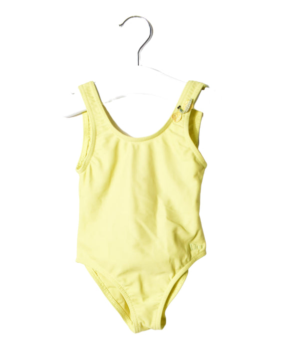 A Yellow Swimsuits from Christian Dior in size 3T for girl. (Front View)