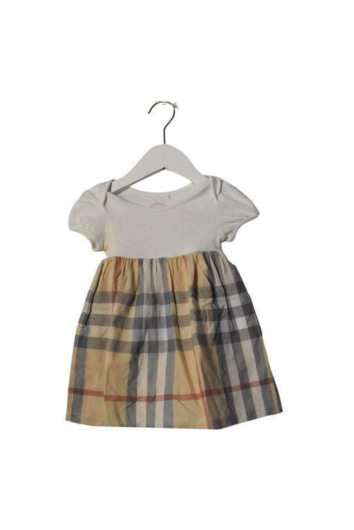 A Brown Short Sleeve Dresses from Burberry in size 6-12M for girl. (Front View)