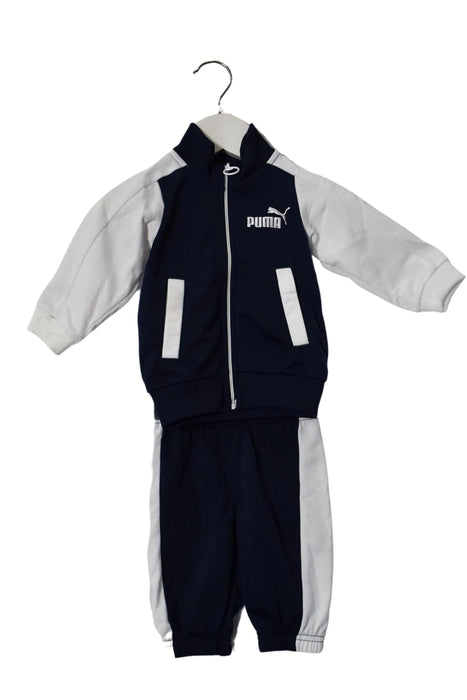 A Navy Tracksuits from Puma in size 3-6M for neutral. (Front View)
