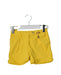 A Yellow Shorts from Bonpoint in size 4T for girl. (Front View)