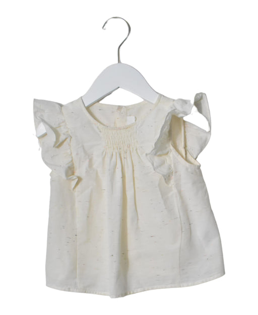 A  Short Sleeve Tops from Bonpoint in size 4T for girl. (Front View)