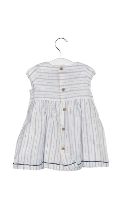 A White Short Sleeve Dresses from Cyrillus in size 6-12M for girl. (Back View)