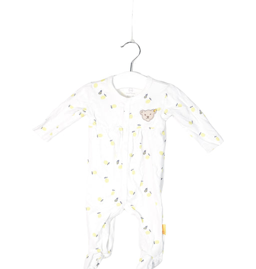 A White Long Sleeve Jumpsuits from Steiff in size 0-3M for neutral. (Front View)