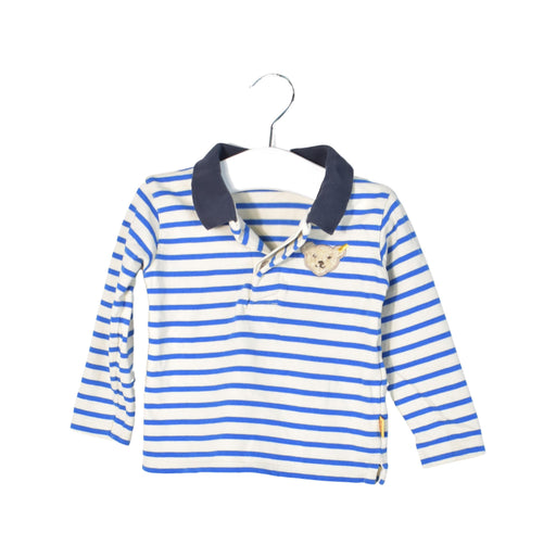 A White Long Sleeve Polos from Steiff in size 6-12M for boy. (Front View)