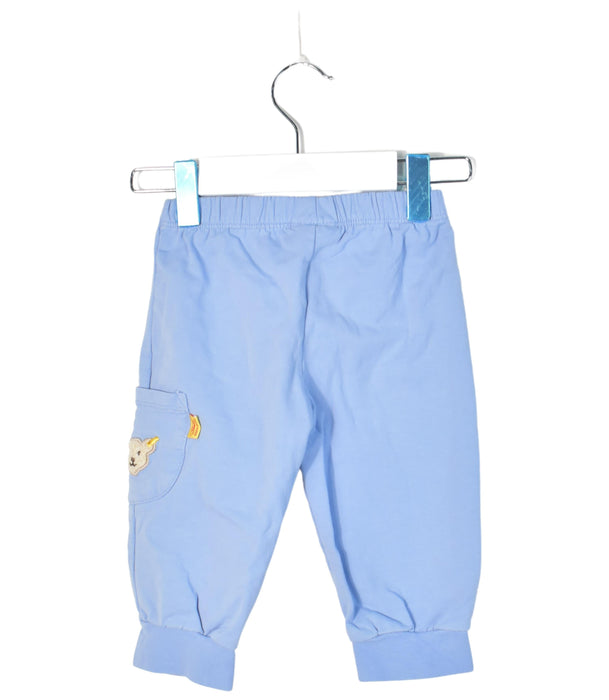 A Blue Sweatpants from Steiff in size 6-12M for boy. (Back View)