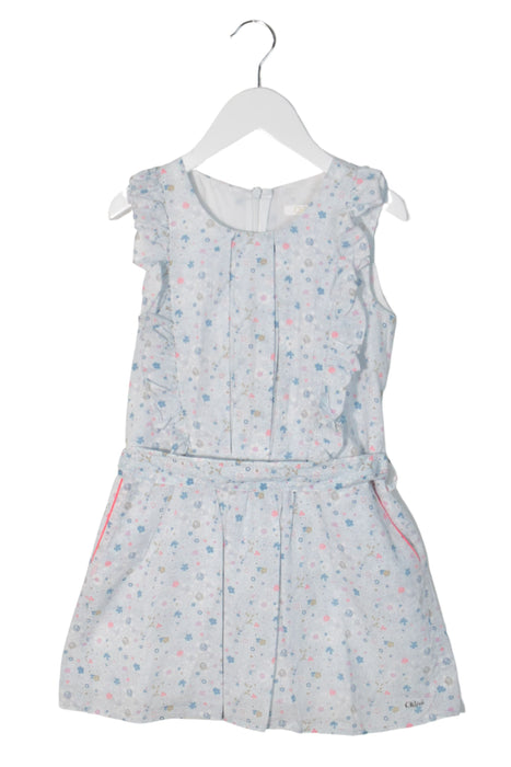 A Blue Sleeveless Dresses from Chloe in size 6T for girl. (Front View)