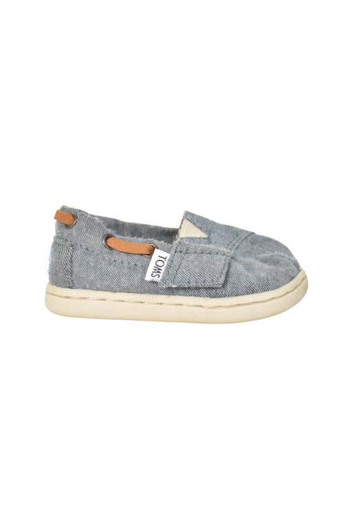 A Blue Slip Ons from Toms in size 12-18M for neutral. (Front View)