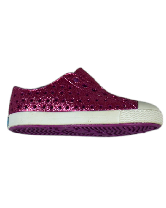 A Pink Slip Ons from Native Shoes in size 6-12M for girl. (Front View)